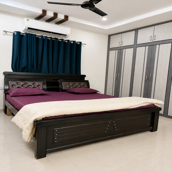 Modern bedroom, luxury bedroom, contemporary interior, elegant bed, wooden bed frame, dark wood furniture, upholstered headboard, king size bed, master bedroom, bedroom decor, spacious room, built-in wardrobe, large wardrobe, grey wardrobe, white wardrobe doors, storage cabinets, glossy flooring, cream floor tiles, blue curtains, dark blue curtains, air conditioner, ceiling fan, recessed lighting, false ceiling, modern ceiling design, pendant-free lighting, ambient lighting, maroon bedsheet, purple bedding, cream comforter, decorative headboard, tufted upholstery, stylish furniture, residential interior, luxury home, modern apartment, bedroom design, interior architecture, home decor, organized bedroom, clean room, sophisticated interiors, neutral walls, wooden accents, contemporary furniture, premium bedroom, spacious wardrobe, bright bedroom, elegant home, real estate interior, upscale living.